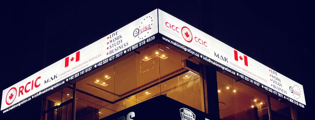 MAK Canadian Immigration Services signage at 43 CCA, DHA Phase 5, Lahore