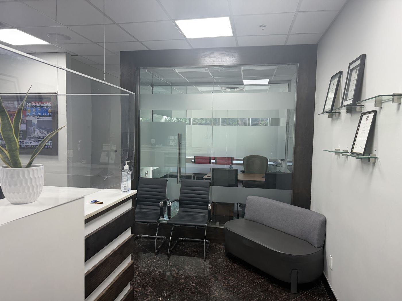 Reception and waiting area inside the MAK Canadian Immigration Services Scarborough office