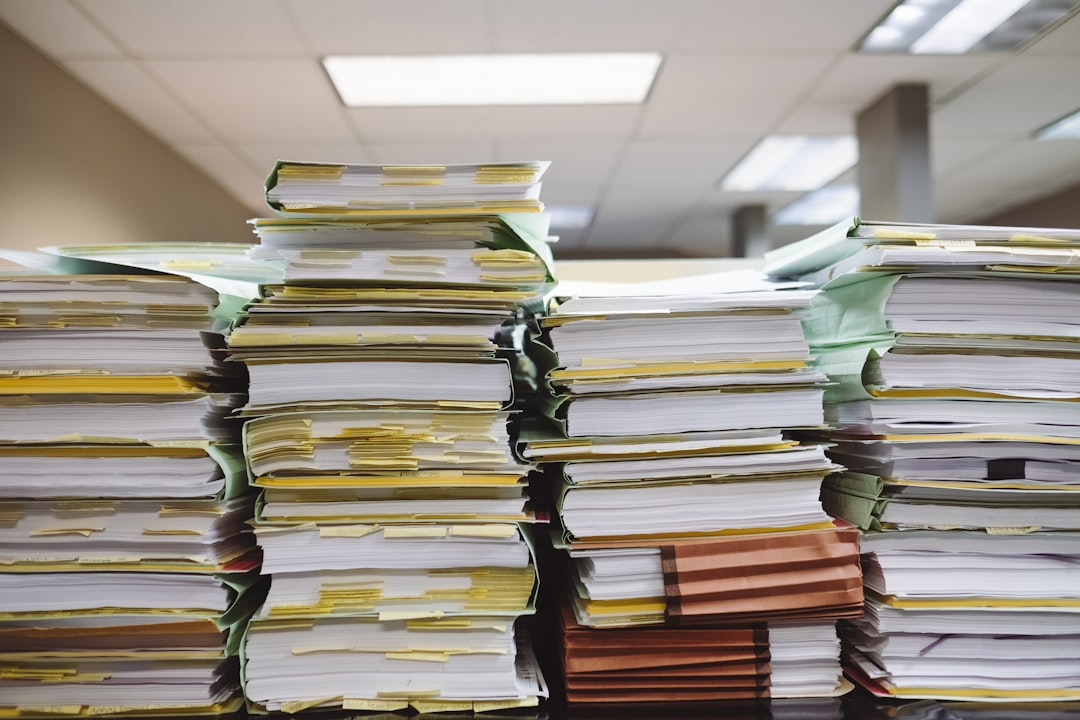 Paper files illustrating immigration status and restoration in Canada