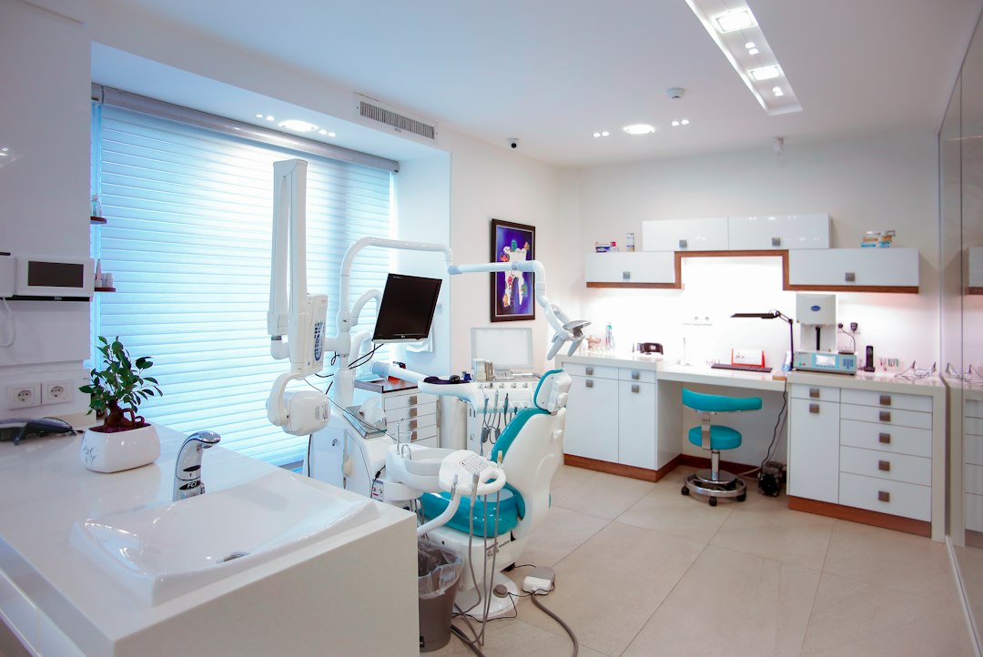 Modern dental treatment room with chair, illustrating the distinction between dentist immigration and Canadian clinical licensing